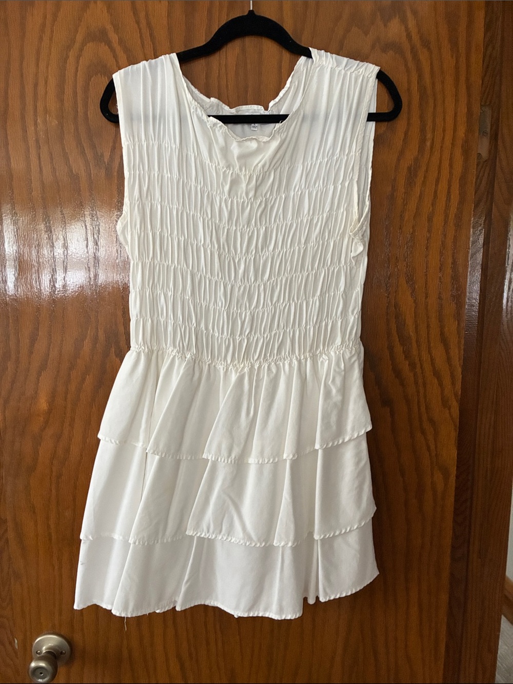 Sleeveless White Tiered Peplum dress